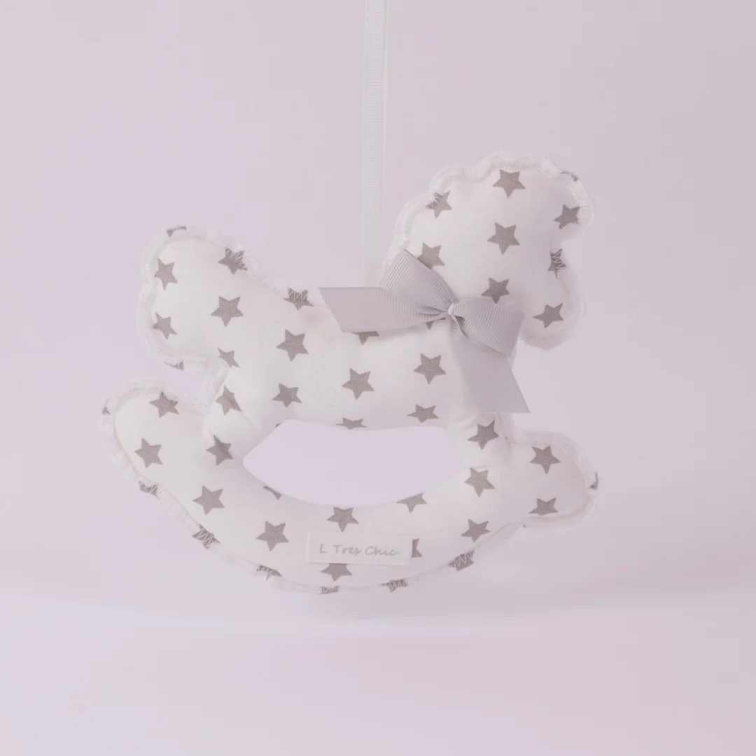 Cavalluccio a dondolo bianco con stelline grigie Cavalluccio a dondolo bianco con stelline grigie