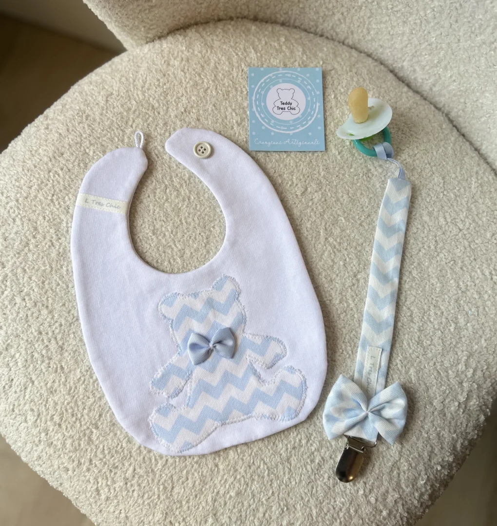 Catenella Portaciuccio a zig zag celeste + Bavetta Catenella Portaciuccio a zig zag celeste + Bavetta