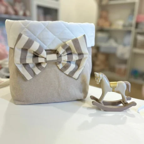 Portapannolini ecru con fiocco a righe